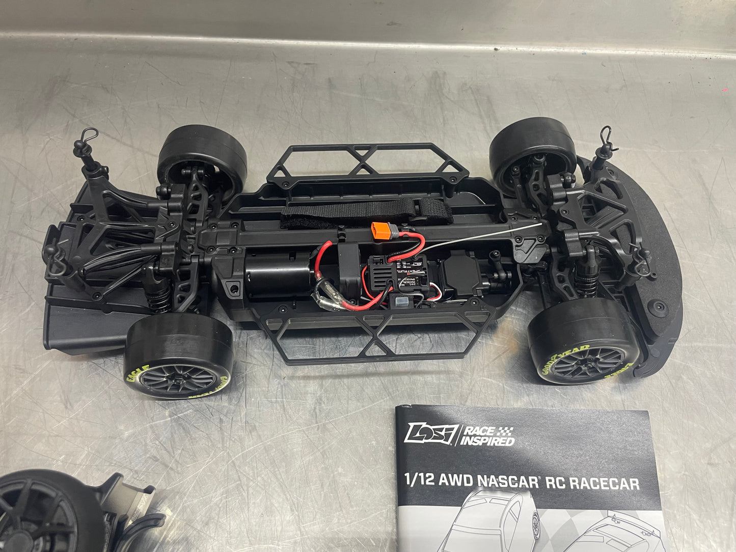 Losi NASCAR Complete Car Less Body, Batteries, & Charger 2025